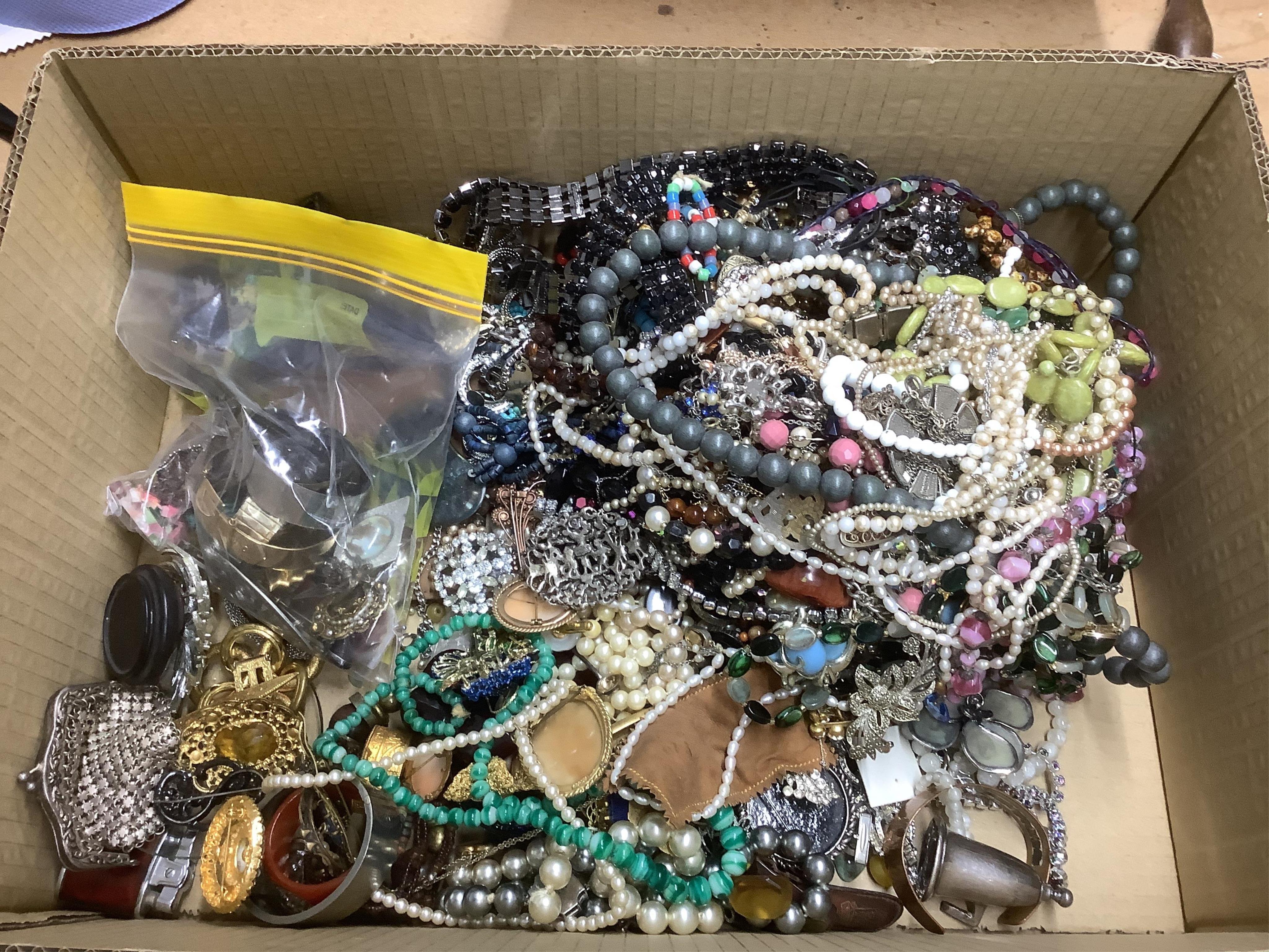 A large quantity of assorted costume jewellery including necklaces, cufflinks, brooches etc. including one part of a Arts & Crafts pewter and Ruskin enamel belt buckle by Norman & Ernest Spittle for the Guild Button and